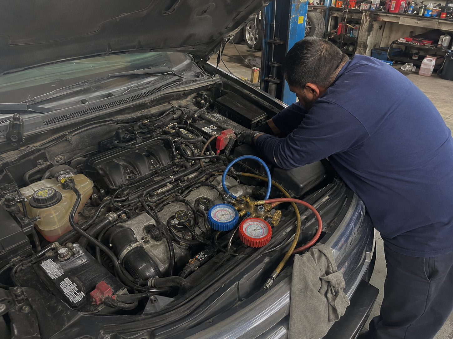 A/C system service with manifold gauges
